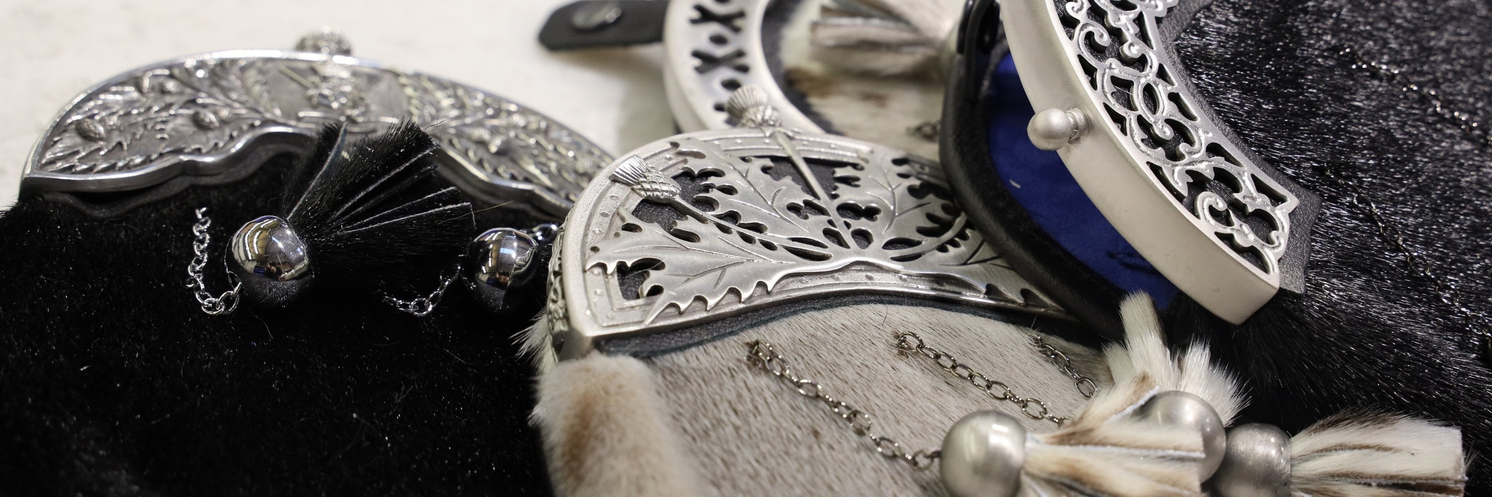 A elegant collection of dress sporrans using premium leathers and furs designed to worn with evening wear for formal occasions.