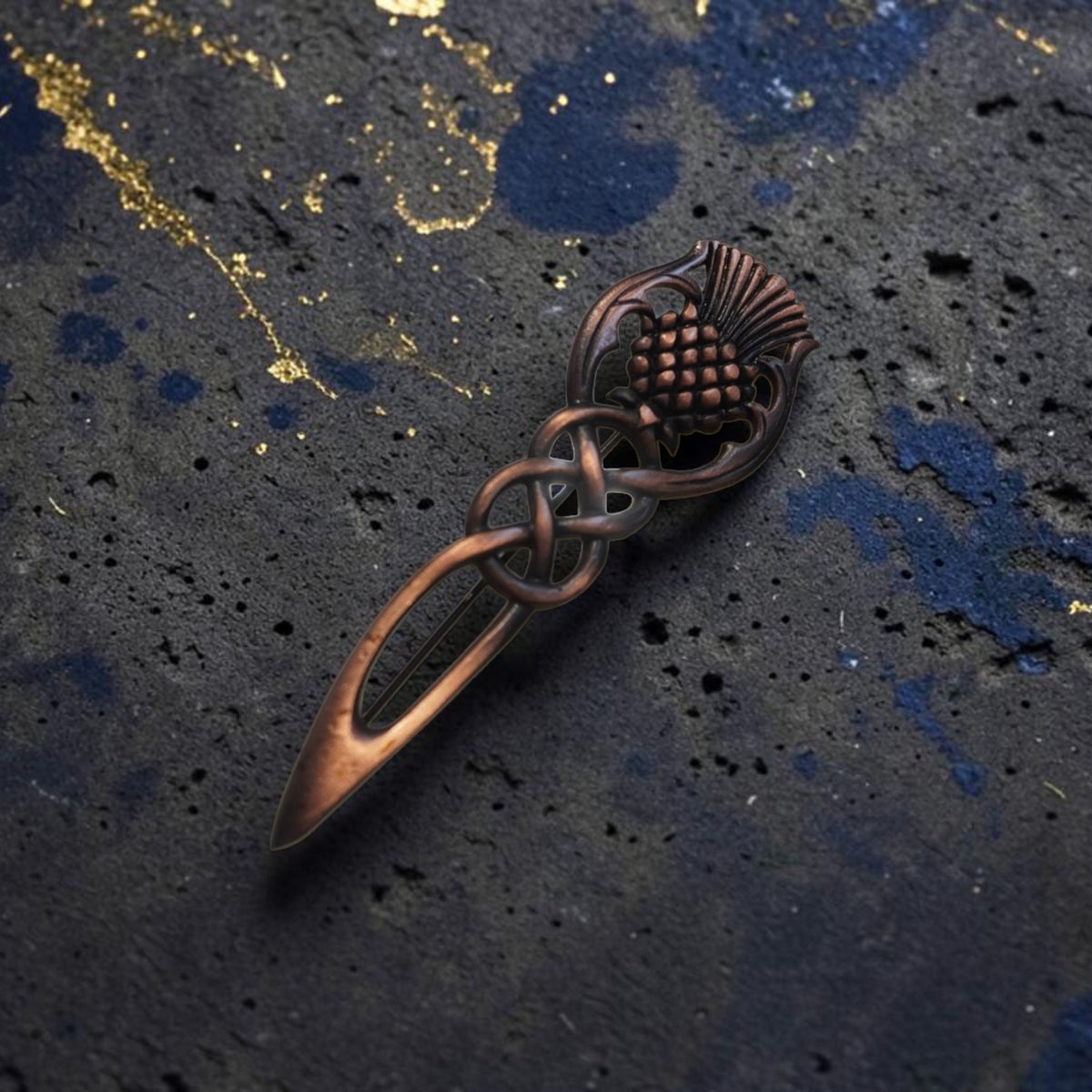 interlaced thistle kilt pin in copper plating