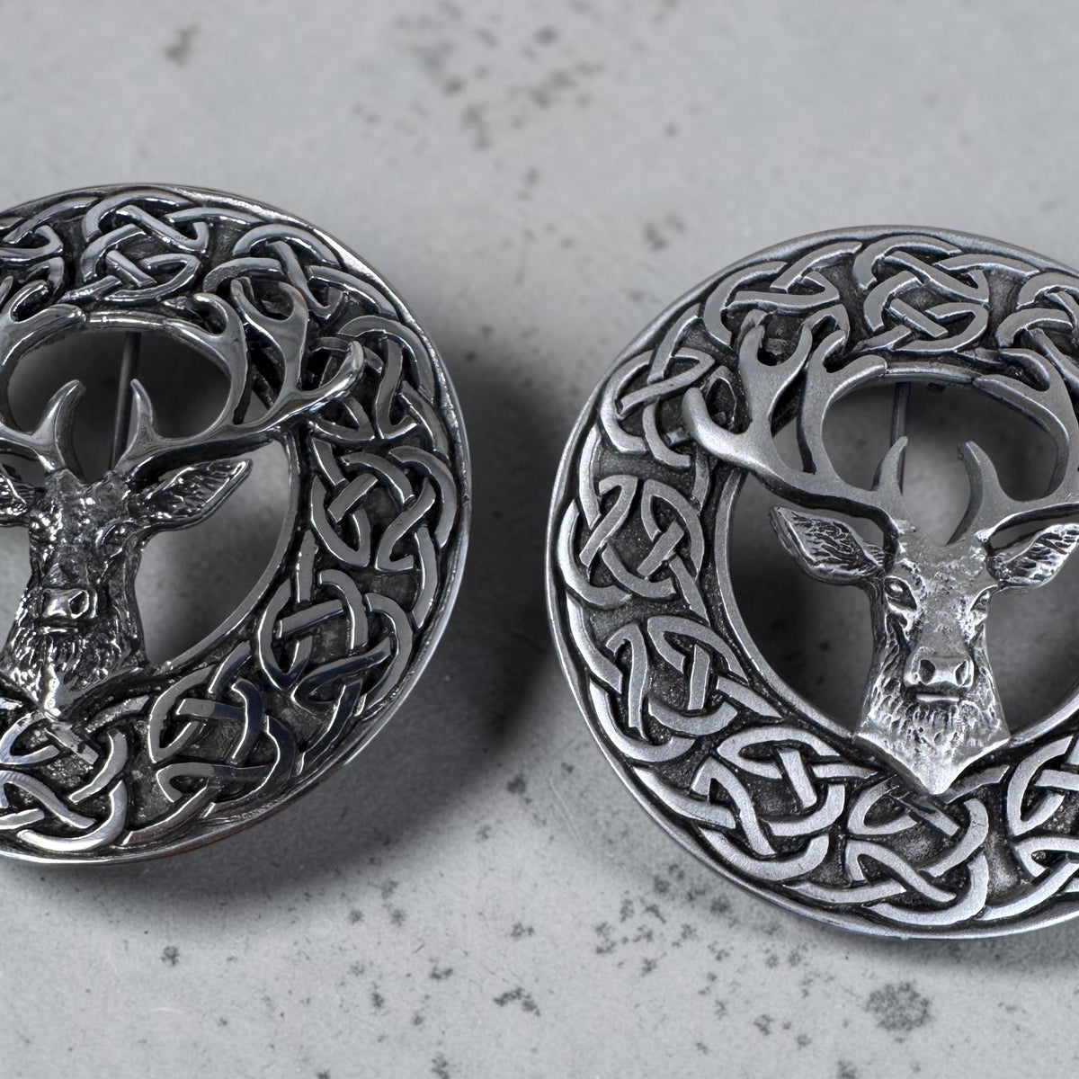 Scottish Stag Plaid Brooches pictured in chrome and antique