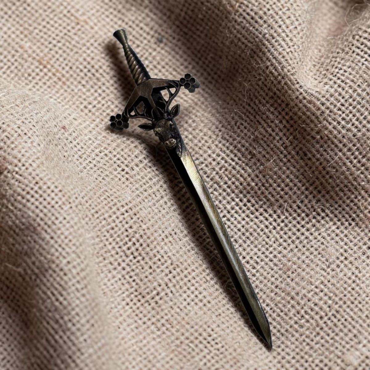 Stag claymore kilt pin by Margaret morrison in pewter with antique brass plating