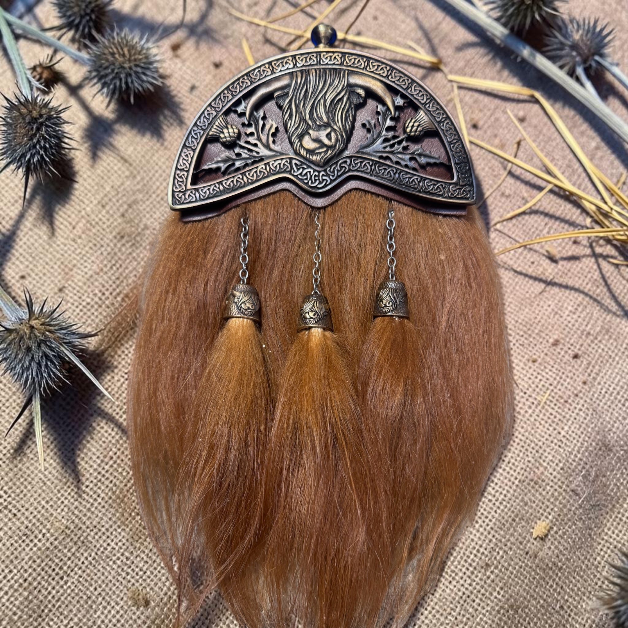 Highland cow dress sporran in antique brass plating