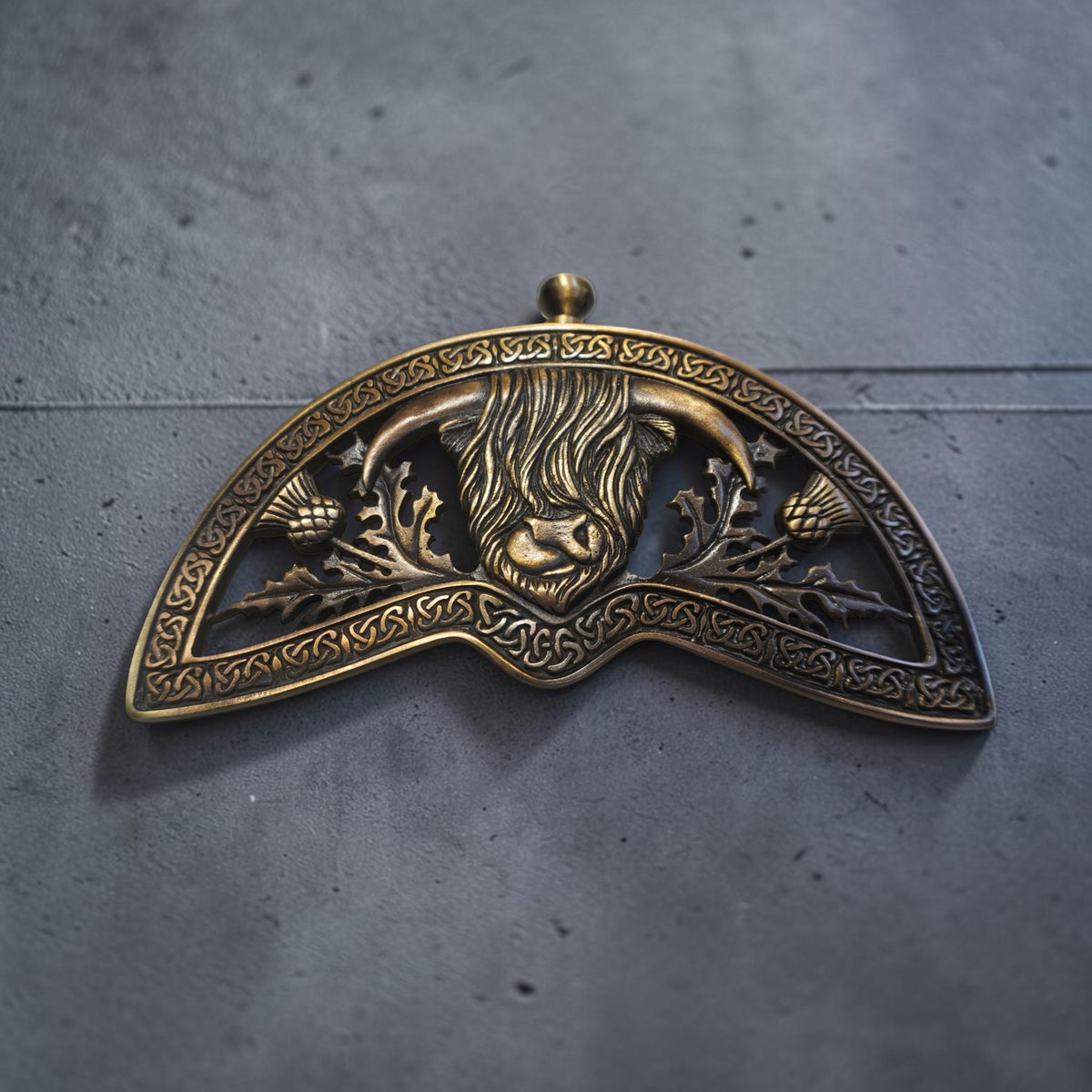 Highland cow sporran cantle in antique brass plating