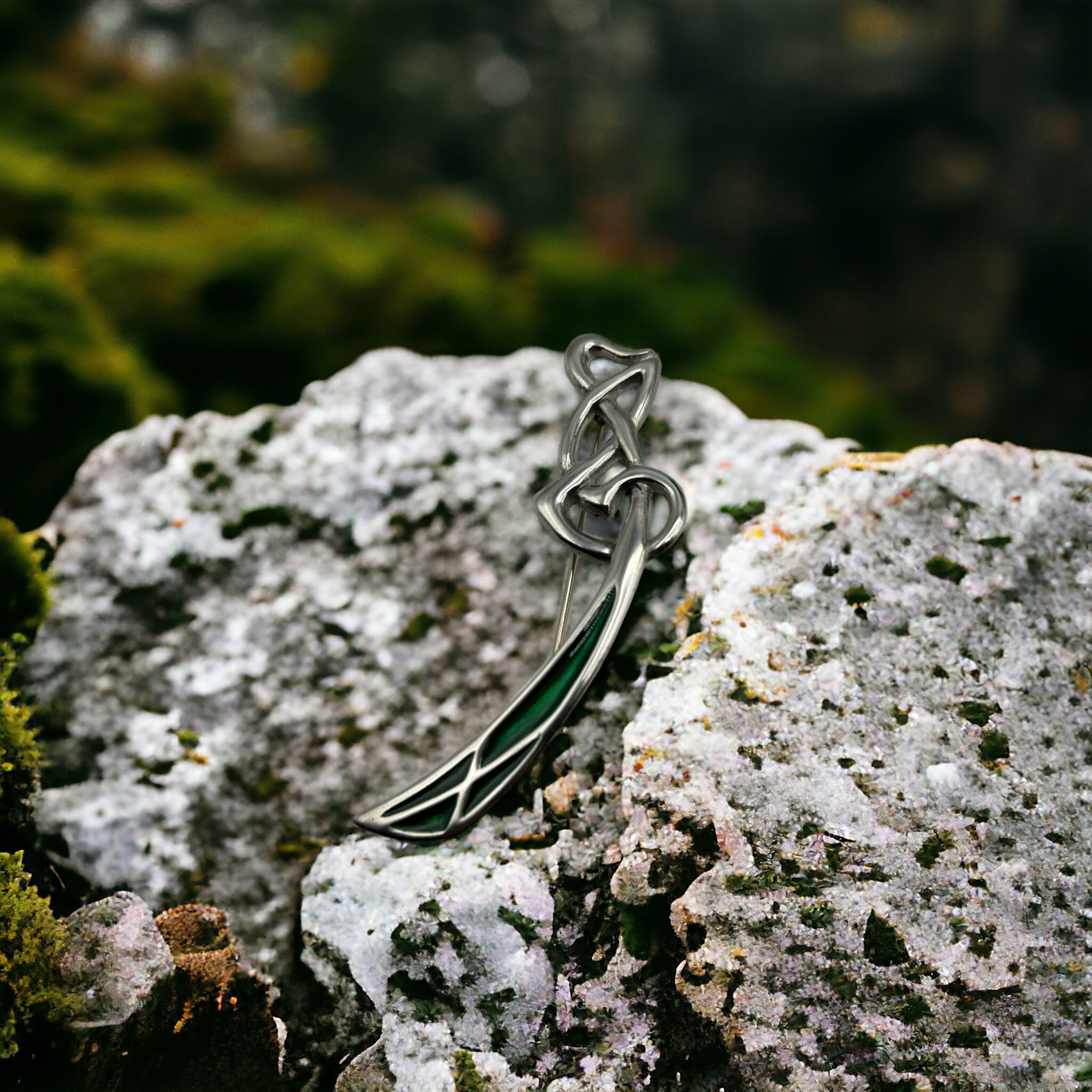 Traditional pewter kilt pin with green enamelled saltire.