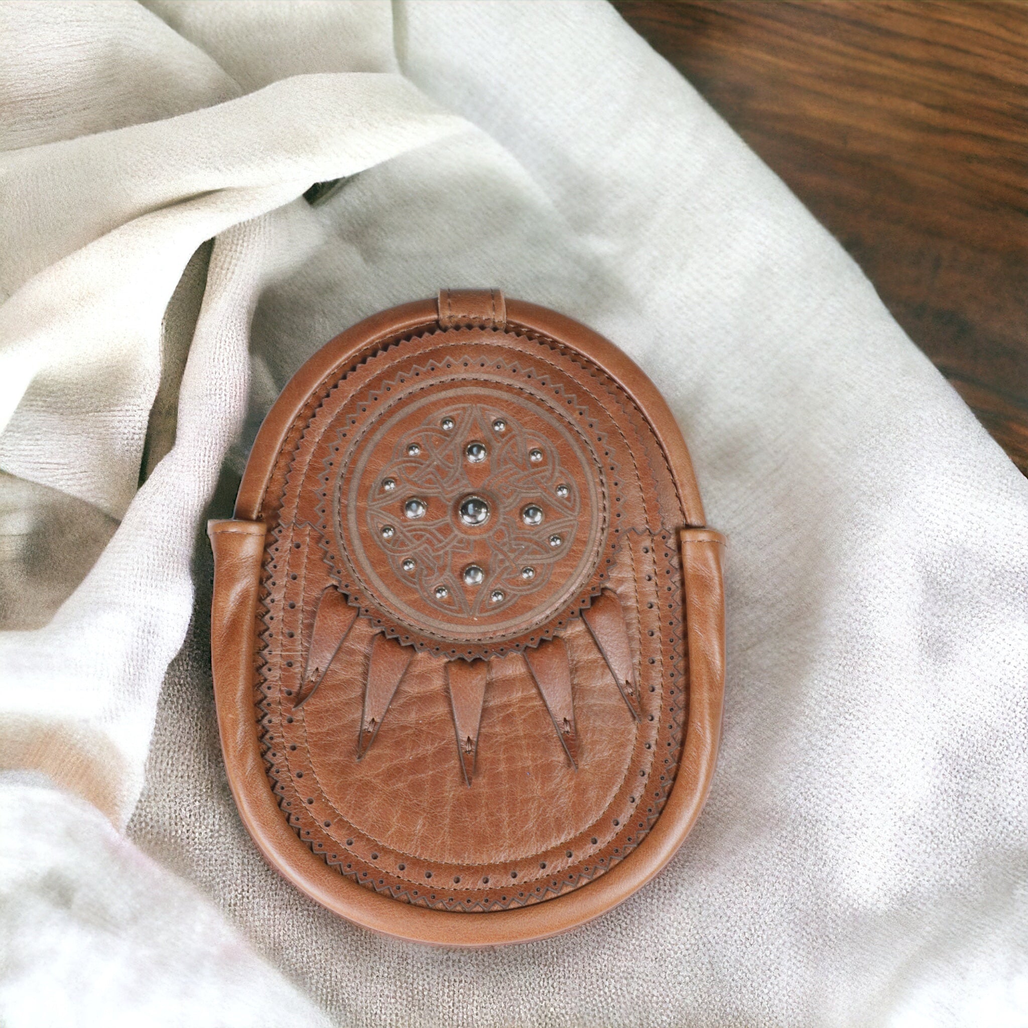 Tradtional all leather hunting sporran with celtic engraved targe design  made by Margaret Morrison