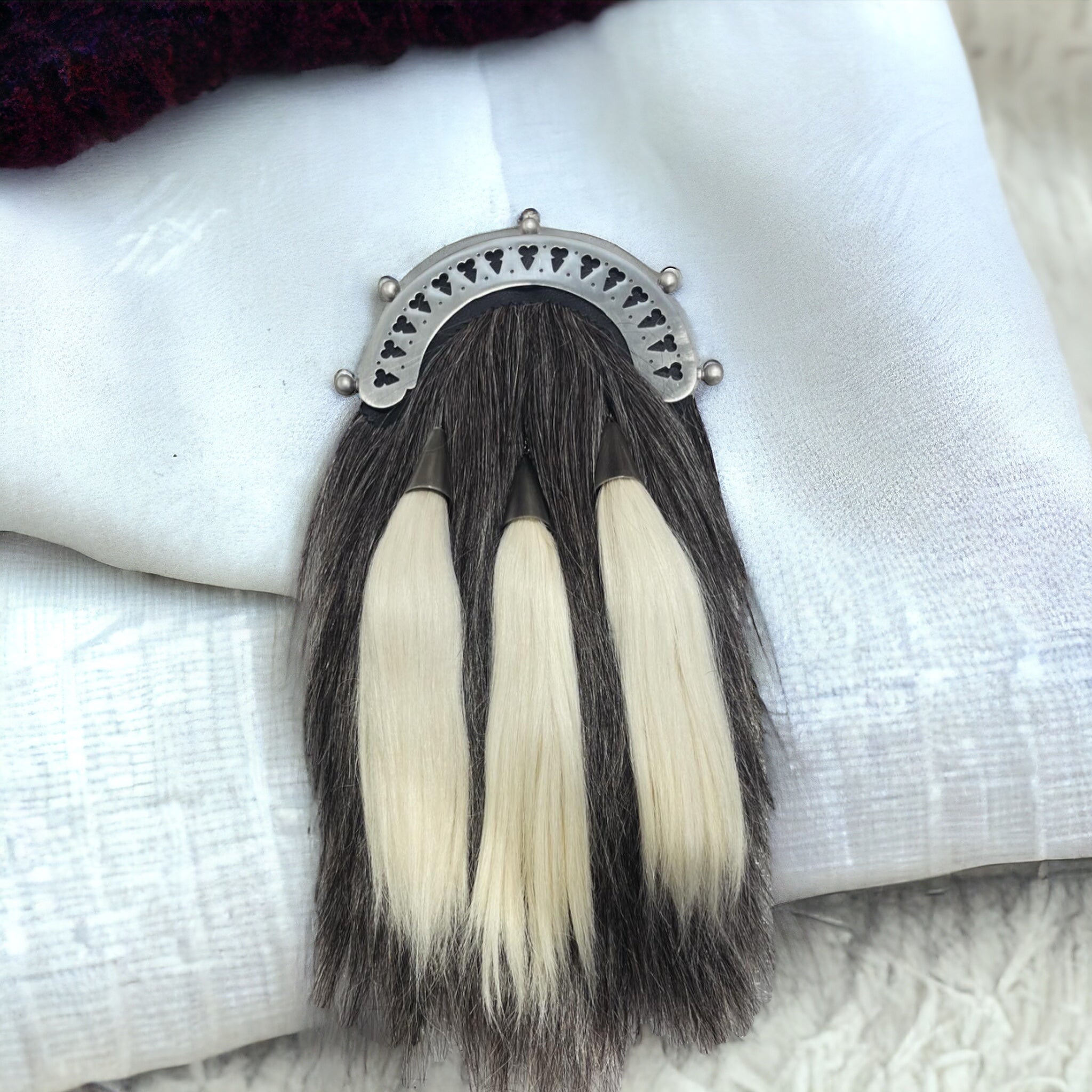 Grey goat hair sporran with three white tassels and London Scottish inspired metal work  made by Margaret Morrison