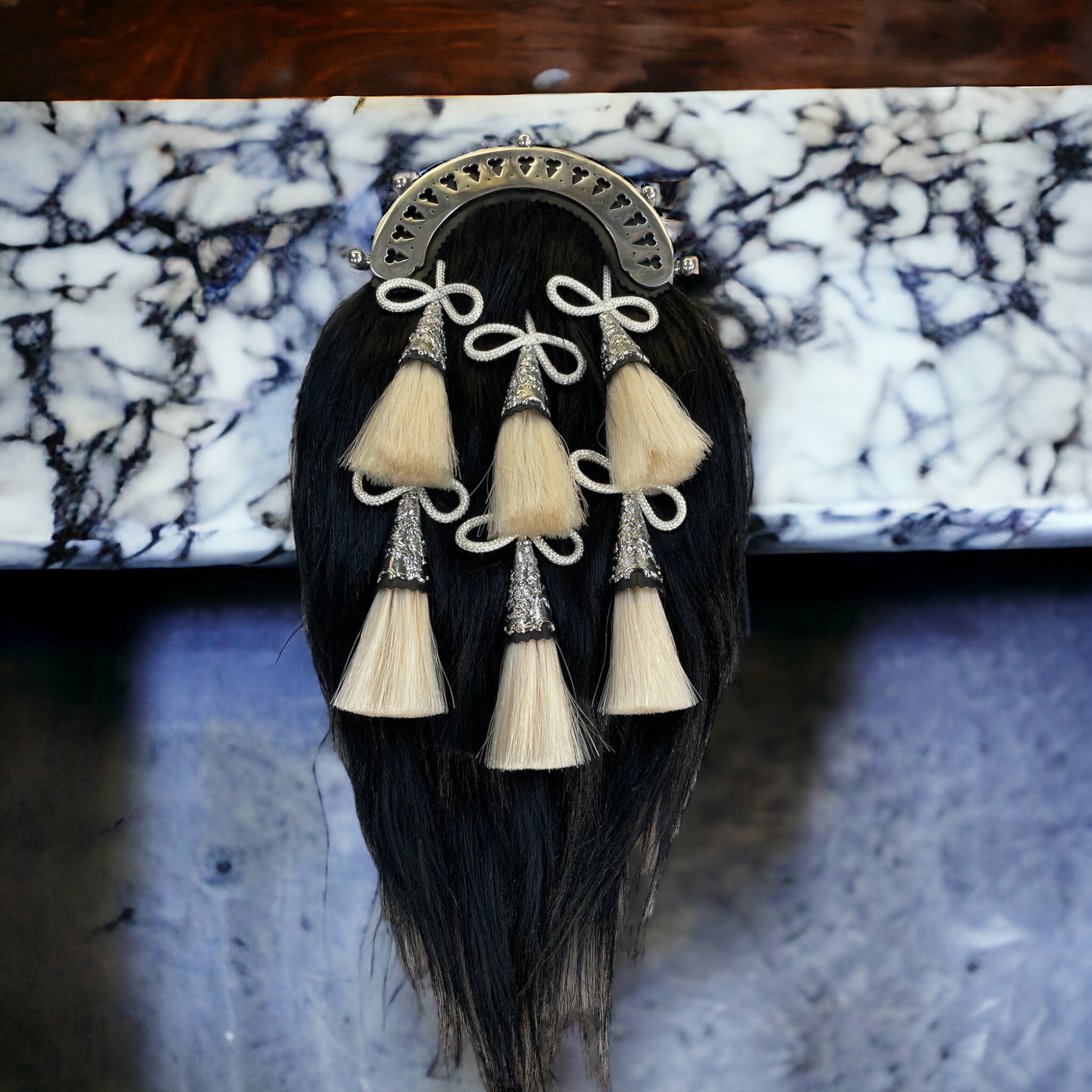 Swinging six style black goat hair sporran with six white horse hair tassels  made by Margaret Morrison