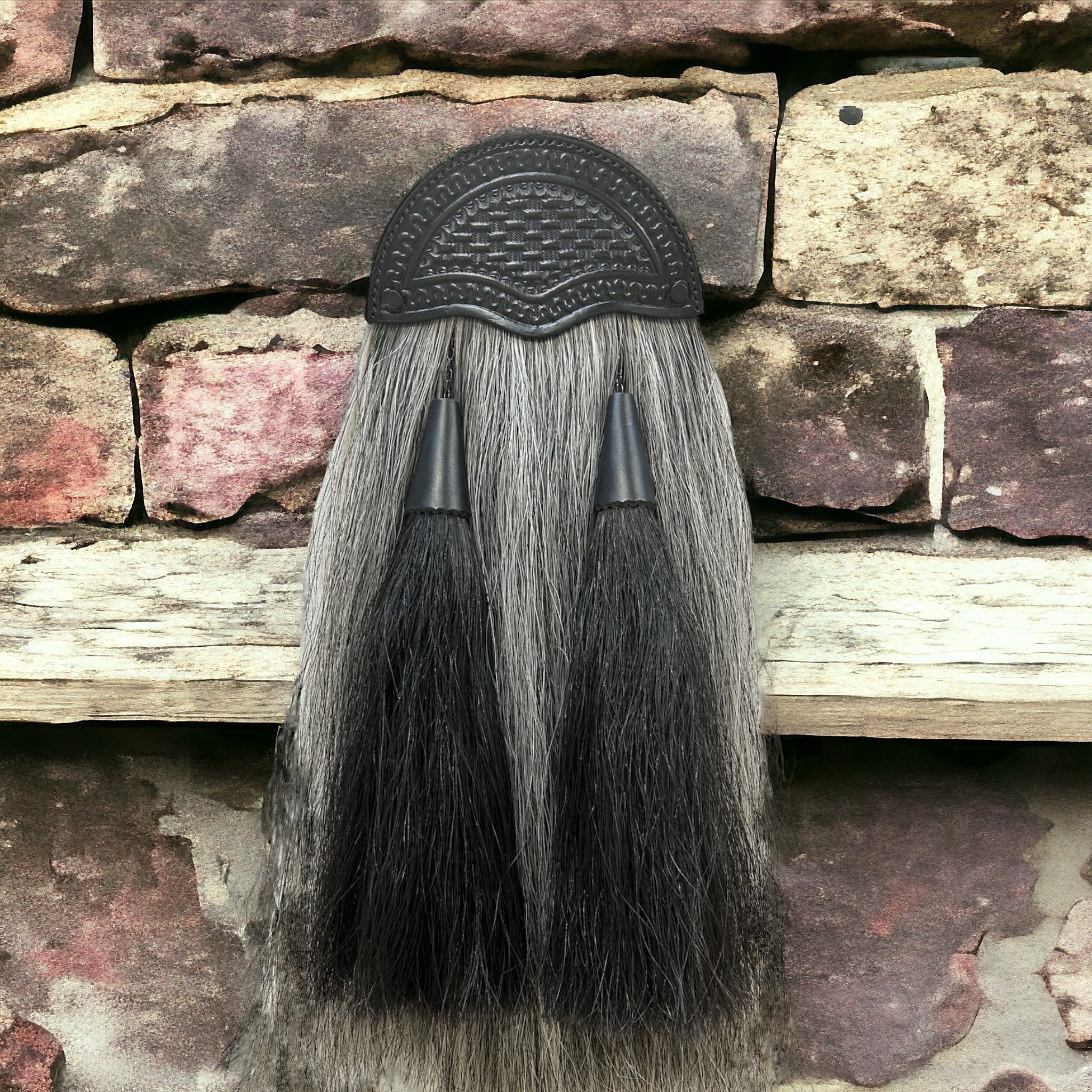 Grey and black horse hair sporran with two black tassels  made by Margaret Morrison