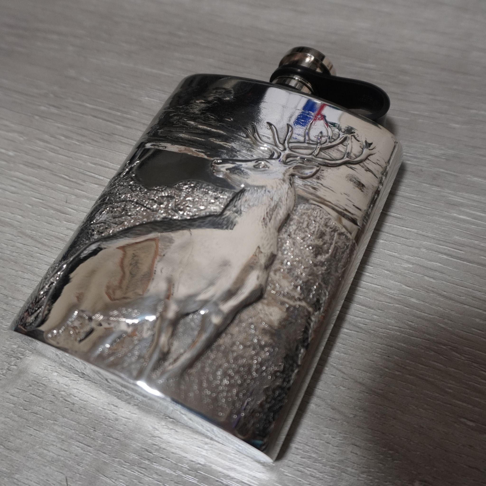 6oz pewter hip flask with embossed Highland stag and Scottish landscape scene, 12cm x 8cm